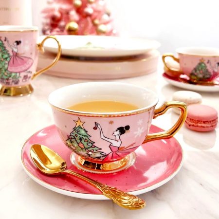 Kopp och fat med dekor i 24 karat guld